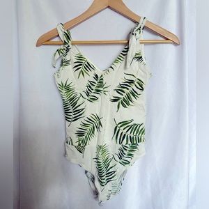 Green leaf white bodysuit with adjustable straps